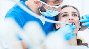 Picture of a dentist giving dental services to patient